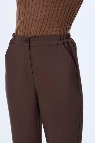 Coffee-colored trousers with elastic waistband 0259